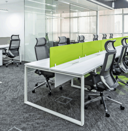 Commercial grade ergonomic outdoor chairs arranged on a modern corporate patio.