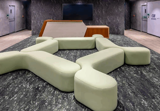 Modern outdoor lounge furniture in a Canadian showroom setting