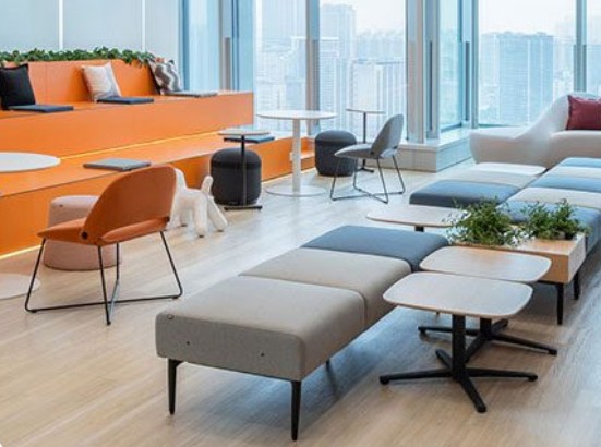 Collaborative outdoor workspace with ergonomic tables and chairs