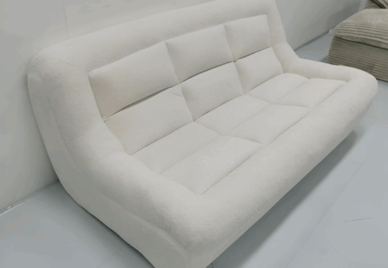 Modern aluminum patio furniture set in a commercial showroom
